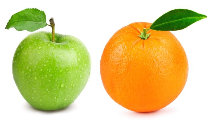 a green apple and an orange