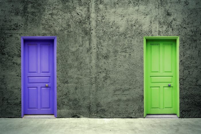 closed blue door and green door