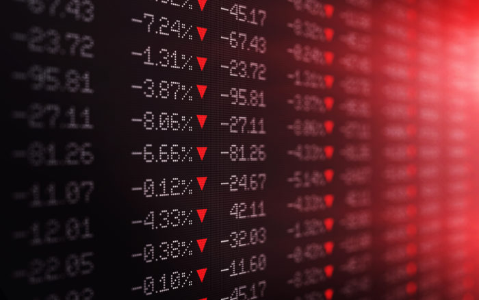 Trading board showing stock prices plummeting